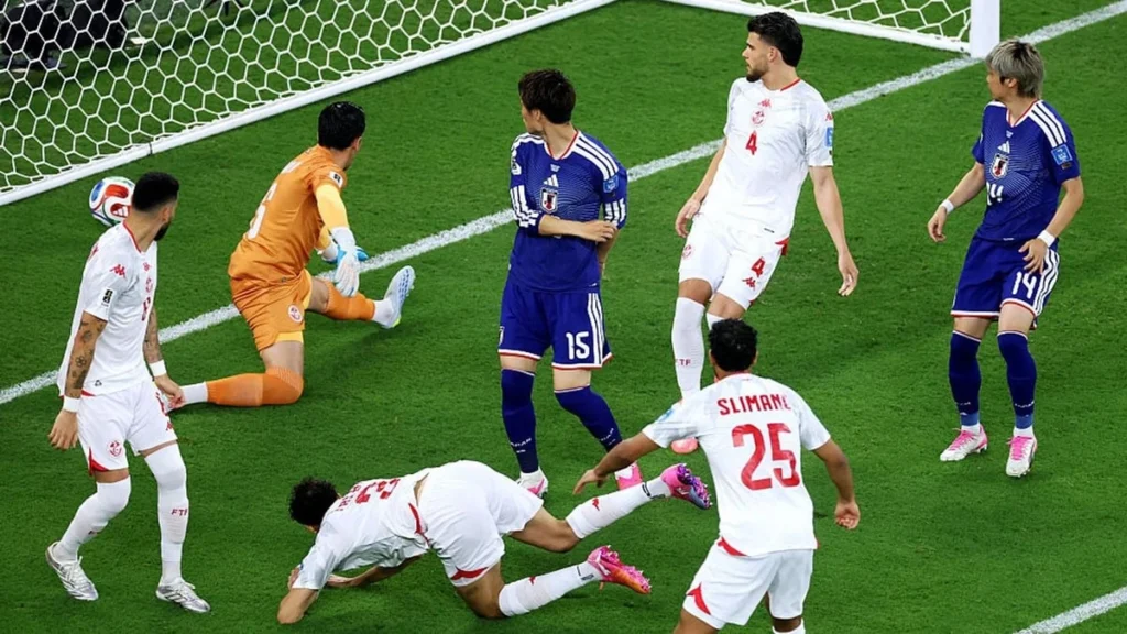 Tunisia players react after a 4-0 defeat against Japan as their FIFA World Cup campaign comes to an end.