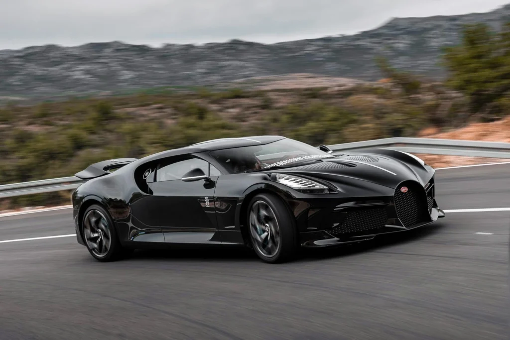 Bugatti La Voiture Noire black hypercar parked with a luxury background, showcasing its premium design and world's most expensive car status.