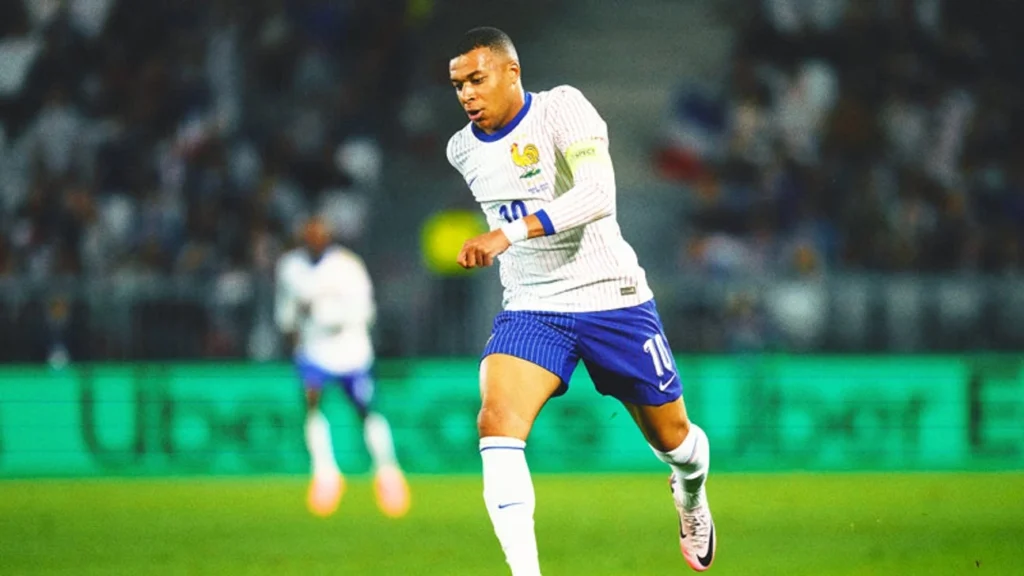France vs Paraguay featured image showing Kylian Mbappe celebrating after scoring the winning penalty in the FIFA World Cup quarter-final.