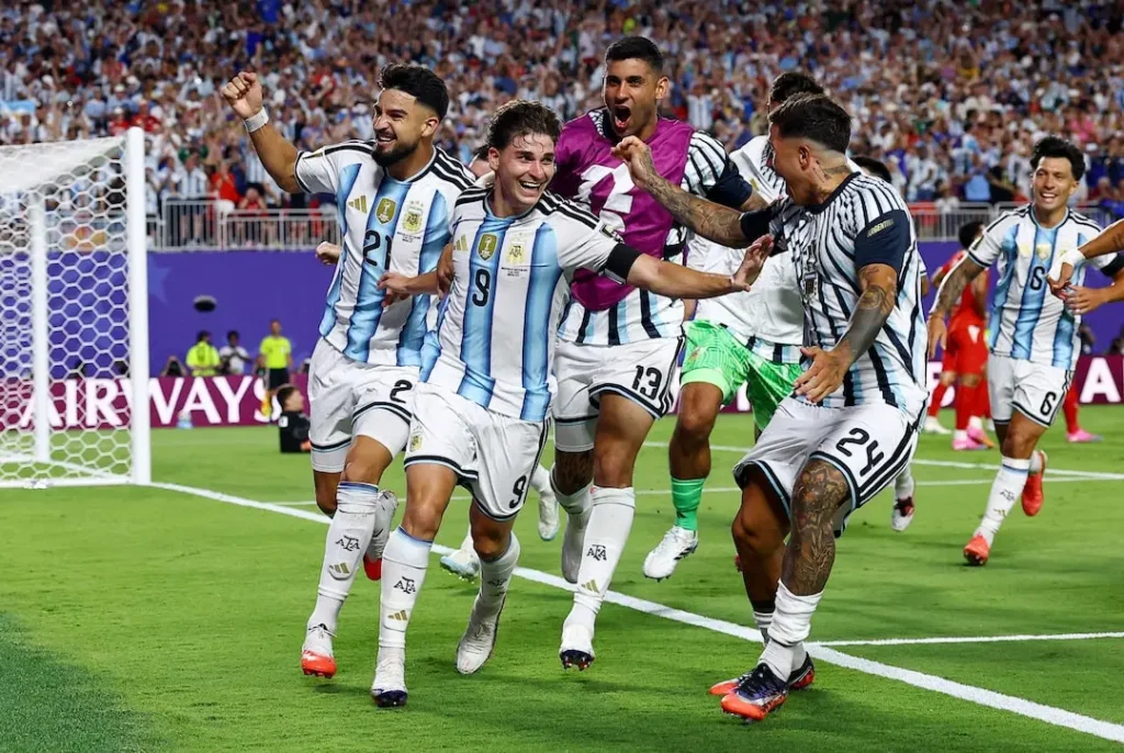 Argentina players celebrate a 3-1 extra-time victory over Switzerland to reach the FIFA World Cup semi-final.