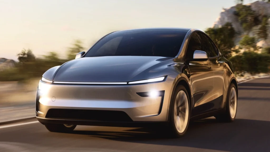 Tesla Model Y 2026 electric SUV parked on a road showcasing its modern design, long range, advanced technology and premium features.