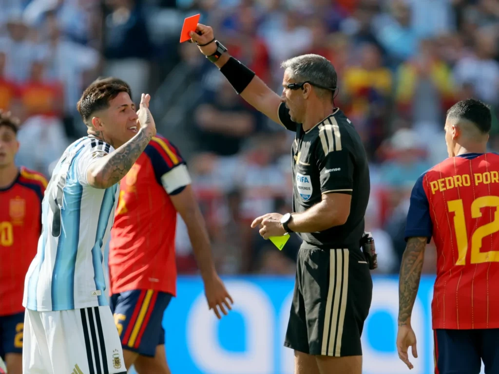 Gavi gestures after the FIFA World Cup 2026 final while Leandro Paredes stands opposite during the post-match confrontation between Spain and Argentina.