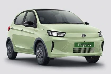 Tata Tiago.ev on a winter road showing EV battery range, cabin heater, and wheel alignment concept.