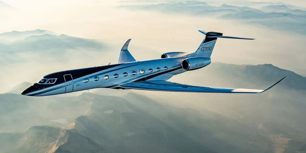 Explore the Gulfstream G700, an ultra-luxury private jet with impressive range, speed, advanced technology and a spacious interior.