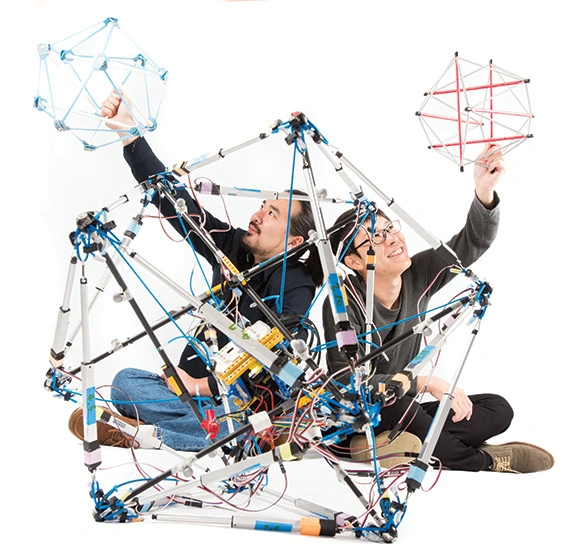 Tensegrity Robot drop test image showing a flexible AI robot surviving a high-impact fall with an innovative shock-absorbing design.